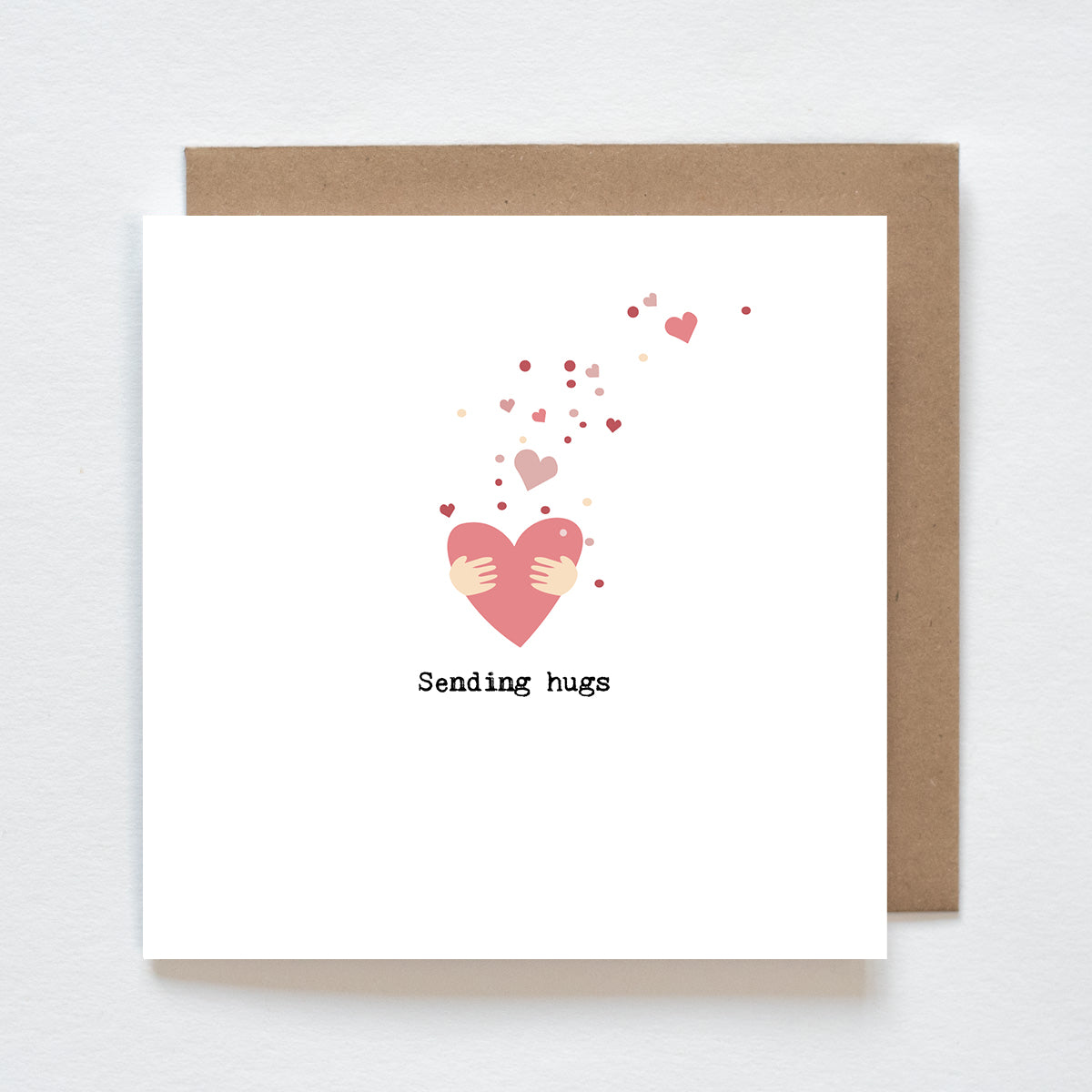 Stuur een knuffel op afstand met de kaart “Sending Hugs”. Minimalistisch design en liefdevolle boodschap – perfect bij moeilijke momenten of gewoon zomaar.